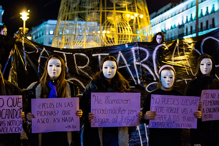 Masked Women Protesting Against Gender Violence During A Demonstration In Madrid For The International Day Against Gender Violence, 25 November 2015