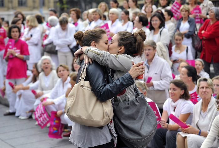 Two Women Kissing During An Anti Gay Marriage Demonstration In France, 2012
