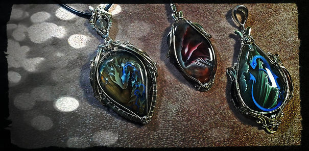 The Artist Draws Miniatures On Semi-Precious Stones. Dragons And Other Animals In Unusual Decorations. The Artist Draws Miniatures On Semi-Precious Stones. Dragons And Other Animals In Unusual Decorations.