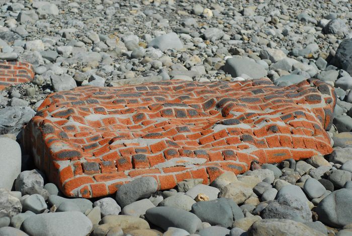 This Whole Brick Wall Which Has Been Shaped By The Sea