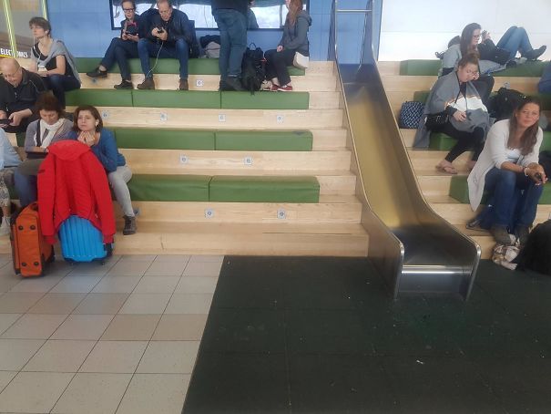 This Airport Waiting Area Has A Slide
