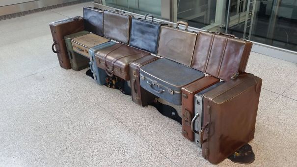 Luggage Turned Into A Place To Sit At The Airport
