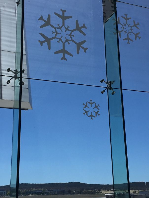 The Snowflake Window Decorations At This Airport Are Made Up Of Planes