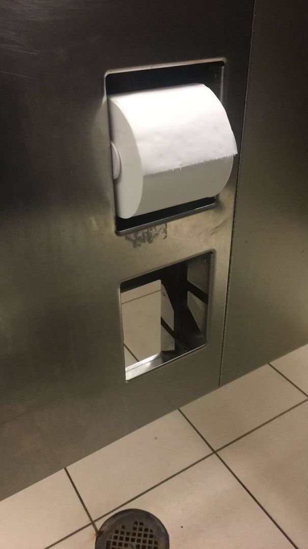 Toilet Paper Sharing Hole In DFW Airport
