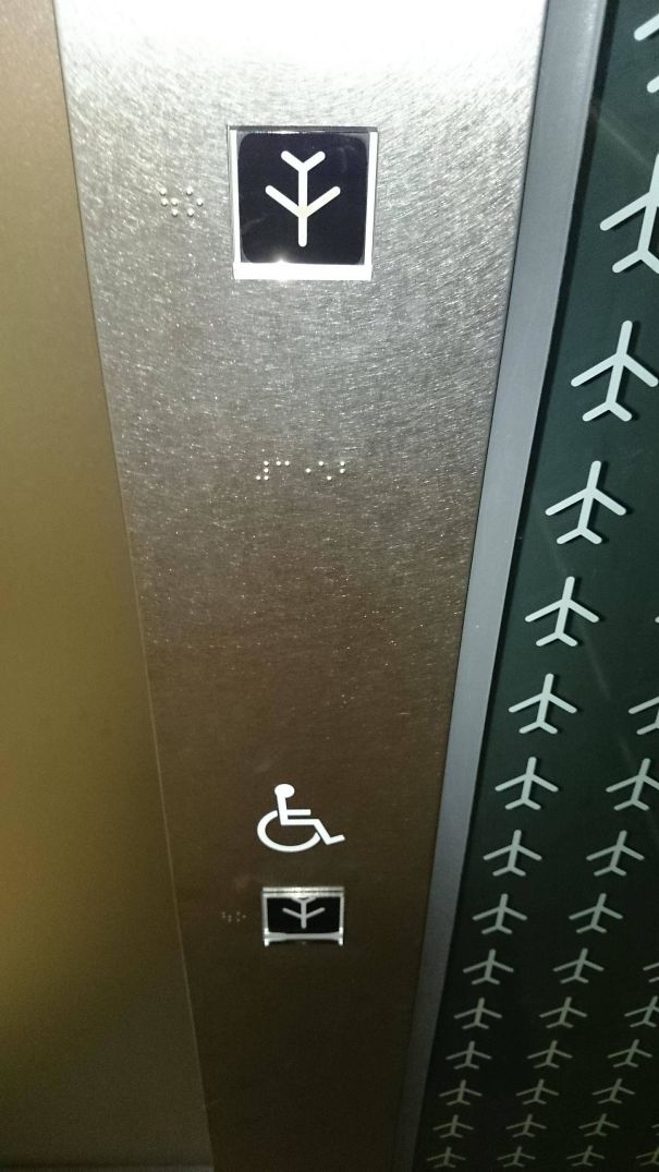 The Down Buttons On This Airport Elevator Look Like A Plane Nosediving