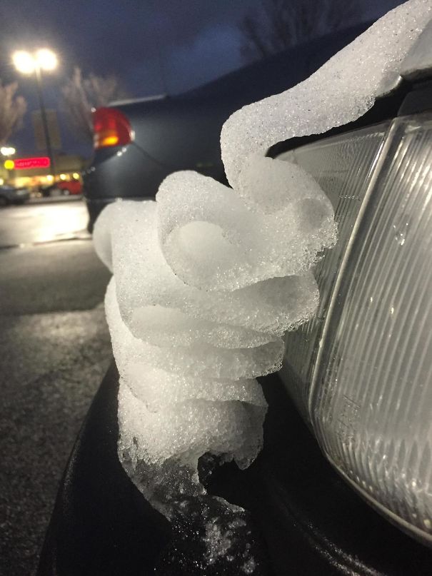 The Way The Snow Slid Down The Hood Of A Car Made It Look Like Ribbon Candy
