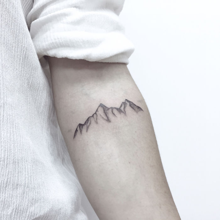Mountain arm tattoo