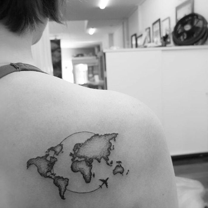earth continents back shoulder tattoo