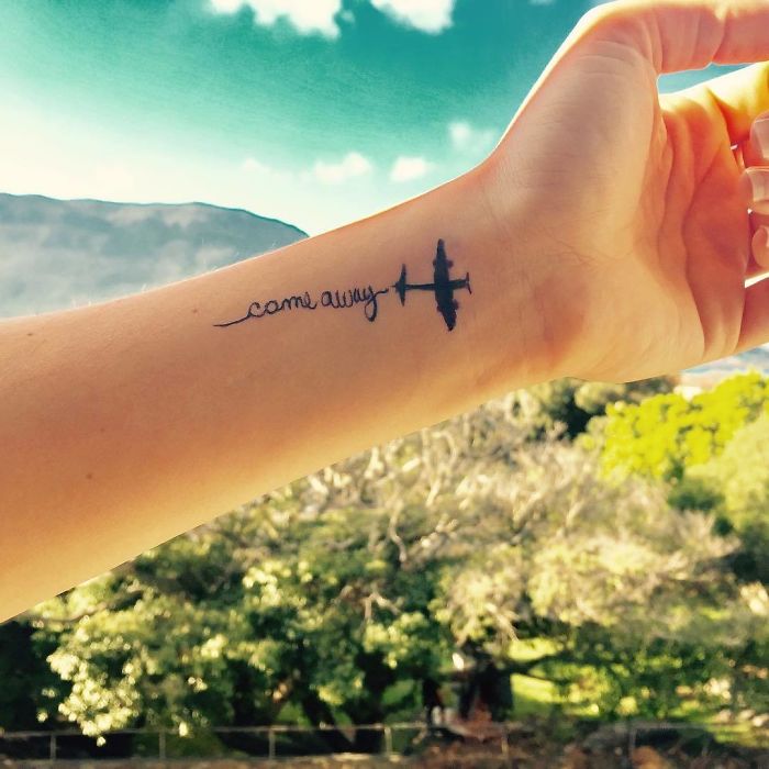 Come Away word with plane wrist tattoo