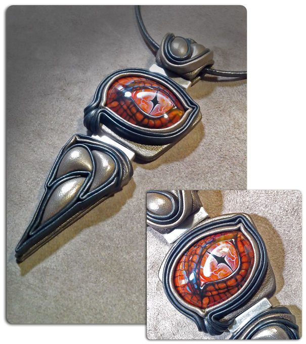 The Artist Draws Miniatures On Semi-Precious Stones. Dragons And Other Animals In Unusual Decorations. The Artist Draws Miniatures On Semi-Precious Stones. Dragons And Other Animals In Unusual Decorations.