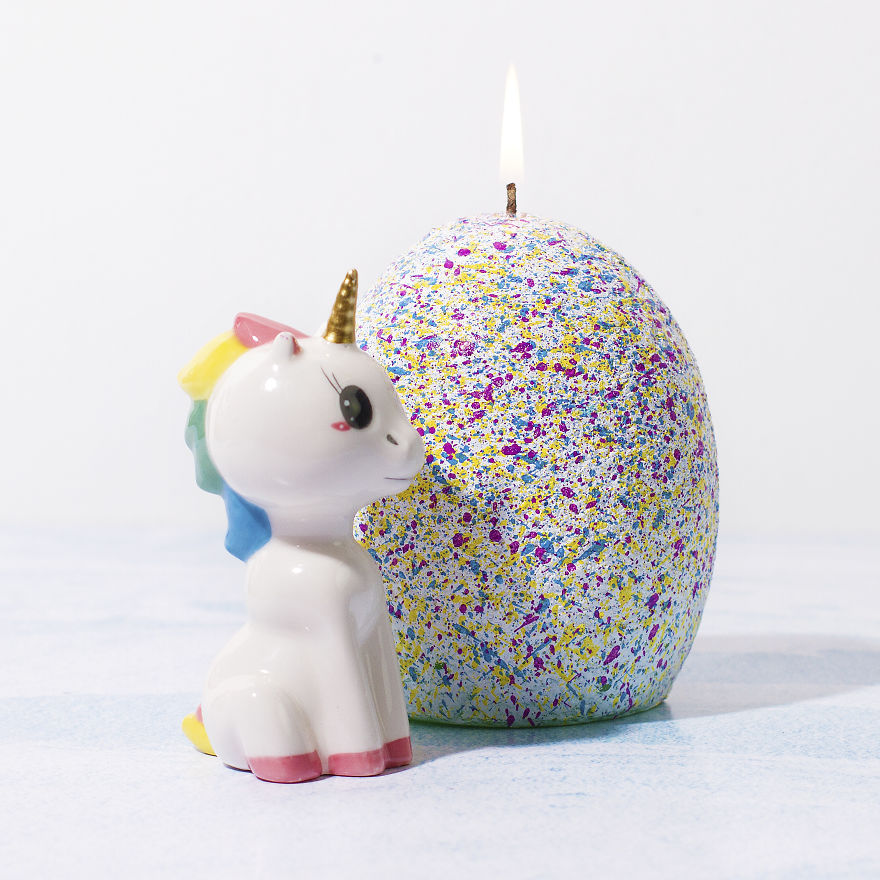 This Egg-Shaped Candle Contains A Baby Unicorn That's Ready To Hatch From Its Rainbow Lair