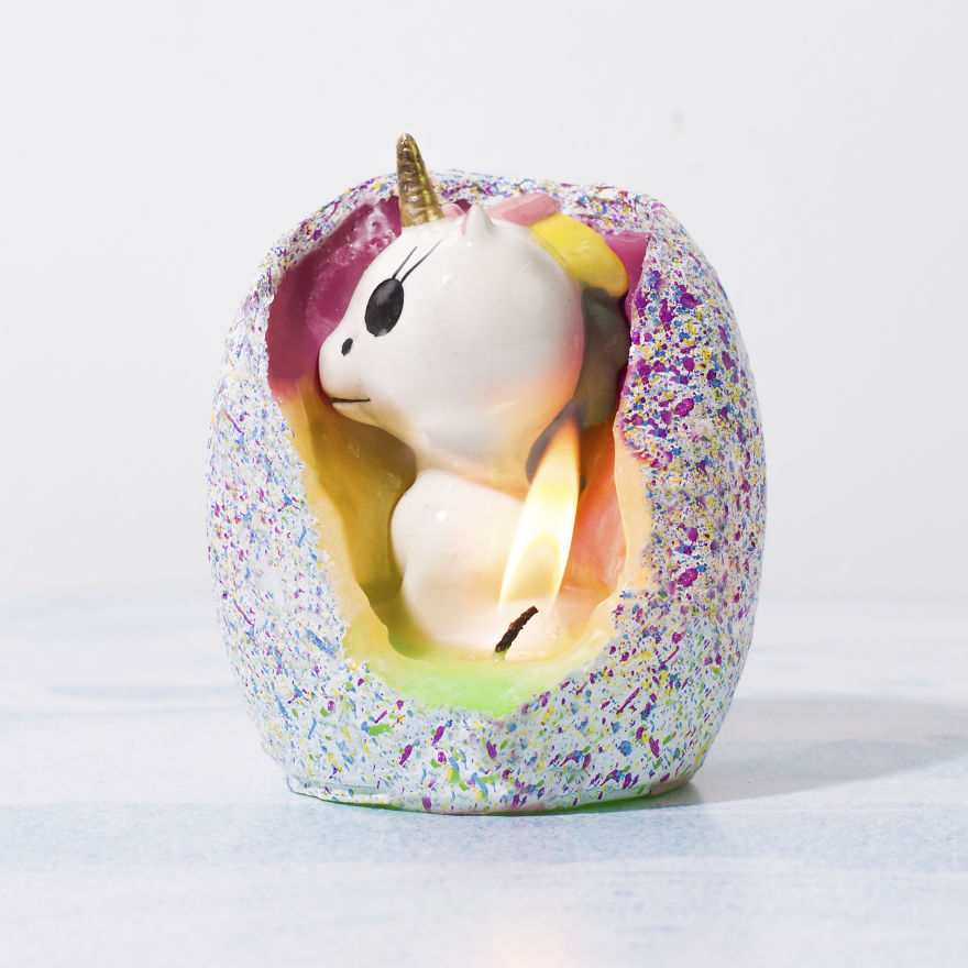 This Egg-Shaped Candle Contains A Baby Unicorn That's Ready To Hatch From Its Rainbow Lair