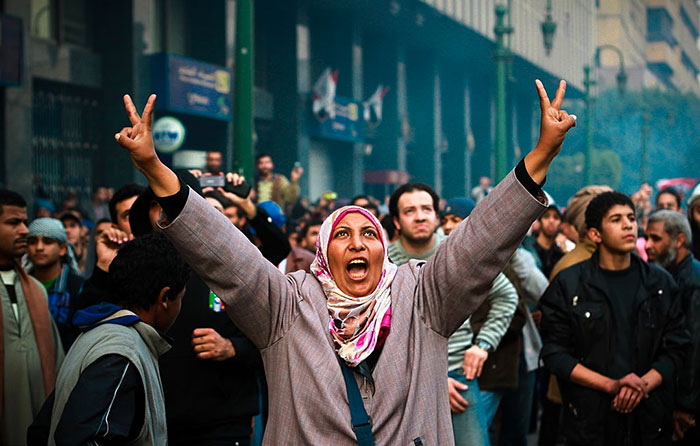 A Woman Protester Waves The Victory Sign During Clashes With Military Police Near Tahrir Square, 17 January 2013