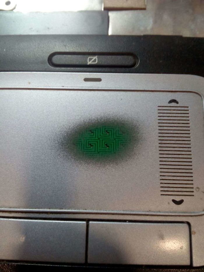This Touchpad Is So Worn Out That You Can See What's Beneath The Paint