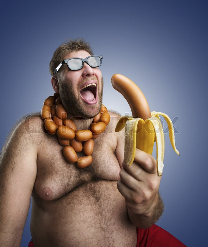 Fat topless man with sunglasses and sausage necklace and a banana in his hand that has sausage instead of a real banana