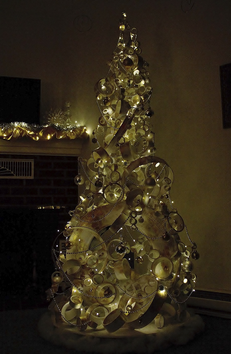 We Made A Christmas Tree From An Old Tire, A Bucket, And 40Ft Of PVC Pipe