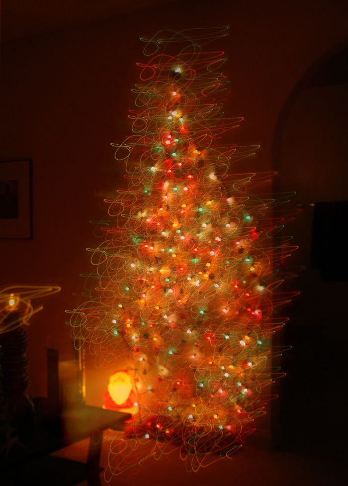 Push-Pin Christmas Tree With Lights. Made With Push-Pins And Strands Of Lights.