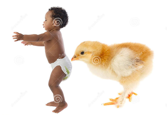 Chick sniffs a kid's butt that is in diapers, and they both are similar size