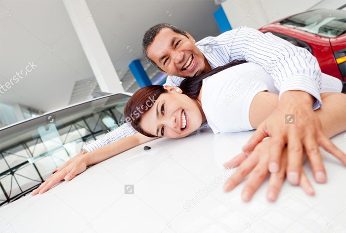 Happy man presses with his body happy woman on the floor