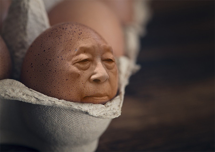 A man photoshopped onto an egg