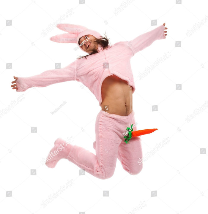 Man in a pink bunny costume and a carrot in his private part