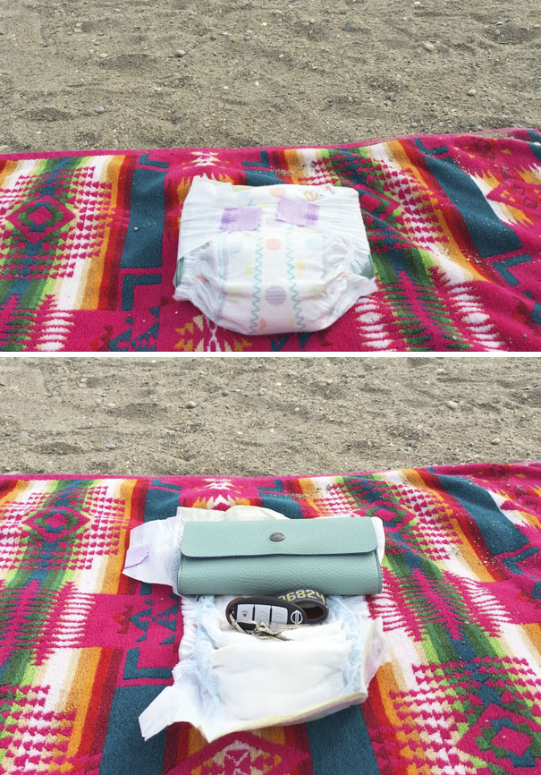 Roll Up Your Valuables In A Diaper To Keep Them Safe At The Beach