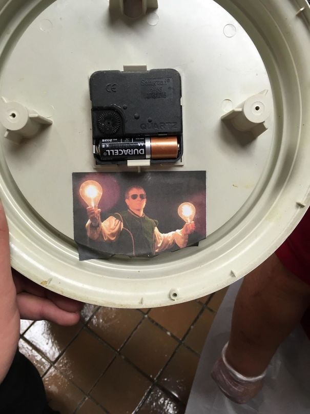 A Co-Worker Posted Pictures Of Himself In Random Places When He Quit. This Is The Back Of A Clock, And He Quit 2 Years Ago