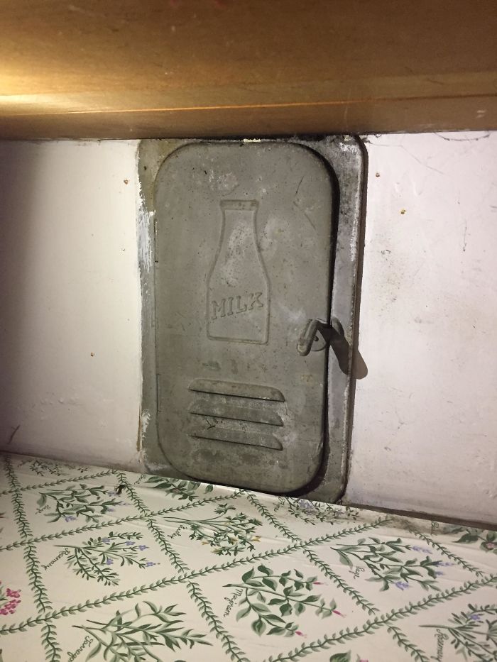 Our New Apartment Has A Little Milk Door Under The Cabinets