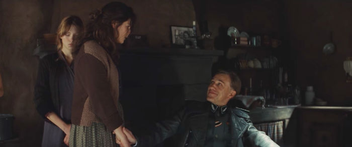 Inglourious Basterds: Hans Lander Subtly Checking The Girl's Pulse At The Start
