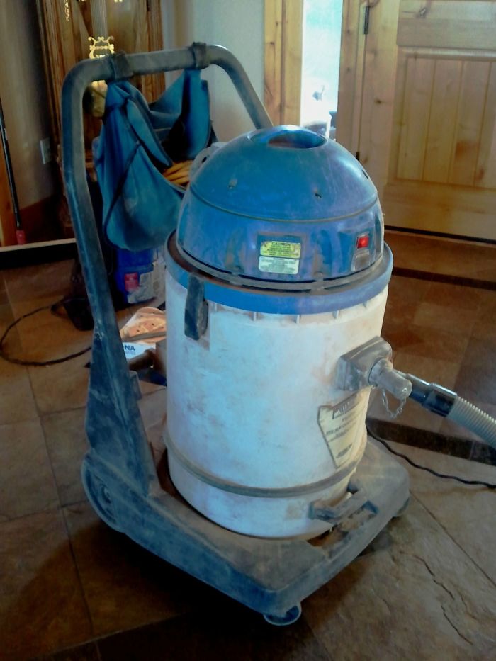 Dusty vacuum resembling R2-D2, an accidental cosplay perfect for Comic Con.