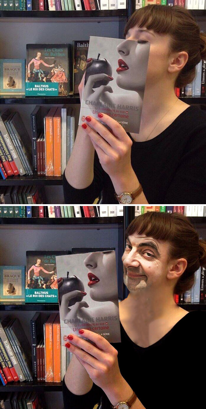 Mujer posando con la tapa de un libro