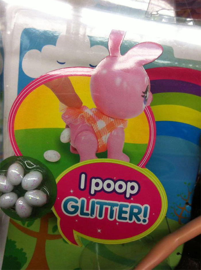 Pink bunny toy with text "I p**p glitter" in colorful packaging, showcasing an epic toy design fail.