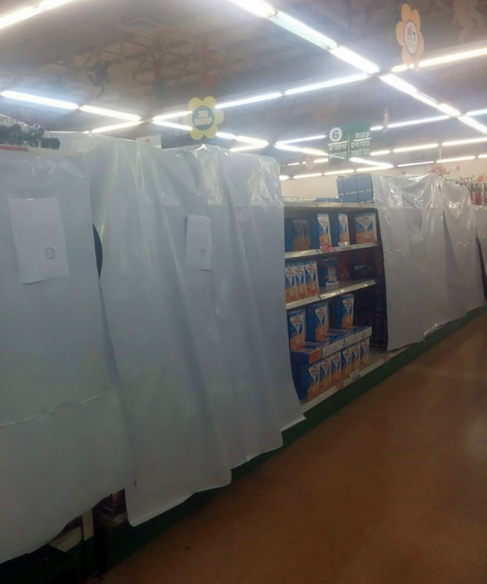 This Is What A Supermarket​ In Israel Looks Like During Passover, With Everything That Includes Hametz (Baked Wheat) Covered In Sheets