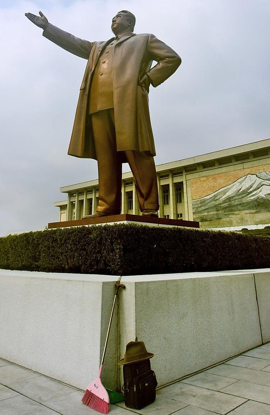 This Is Never Supposed To Happen: A Broom Standing On The Base Of Kim Il Sung’s Statue In Mansudae, In Pyongyang