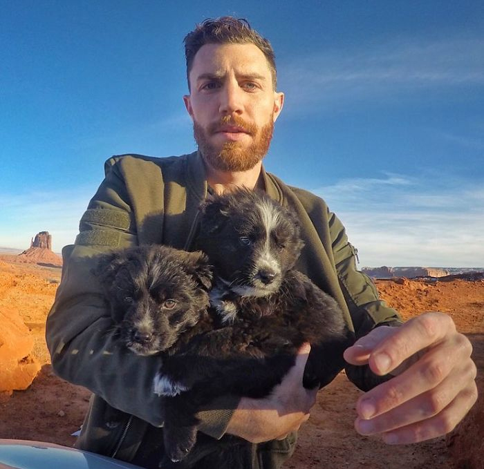Man Finds Two Puppies Abandoned In The Middle Of The Desert, Takes Them On Epic 30,000-Mile Trip