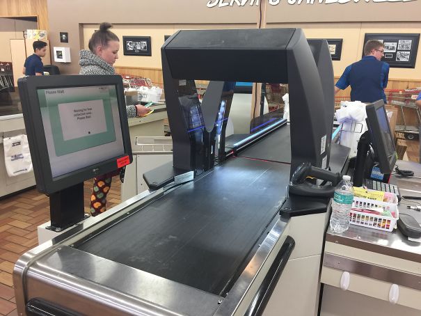 This Check Out Lane Scans Items As They Pass Through On The Belt