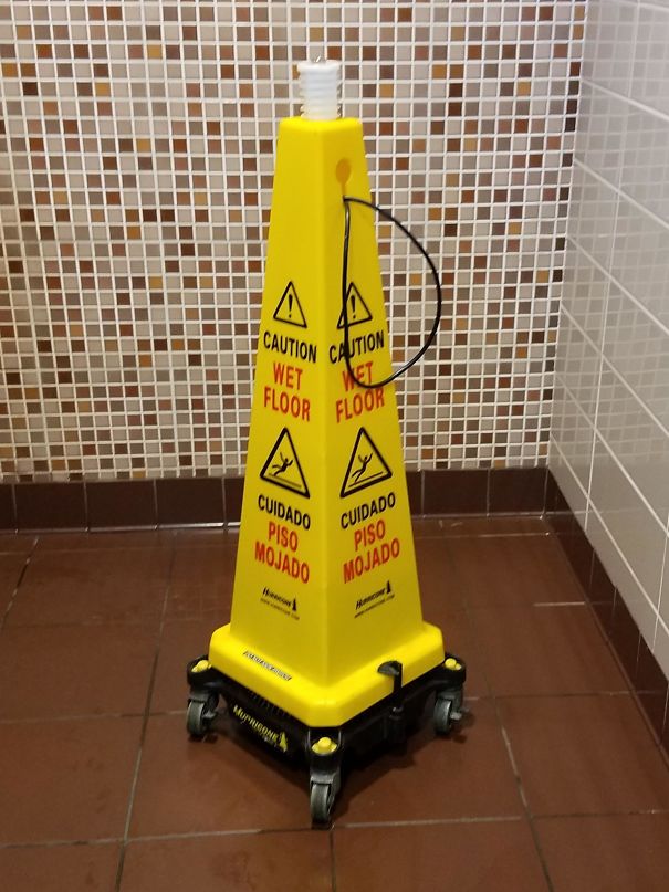 This Wet Floor Sign Has Fans Built Into The Base To Help Dry The Floor