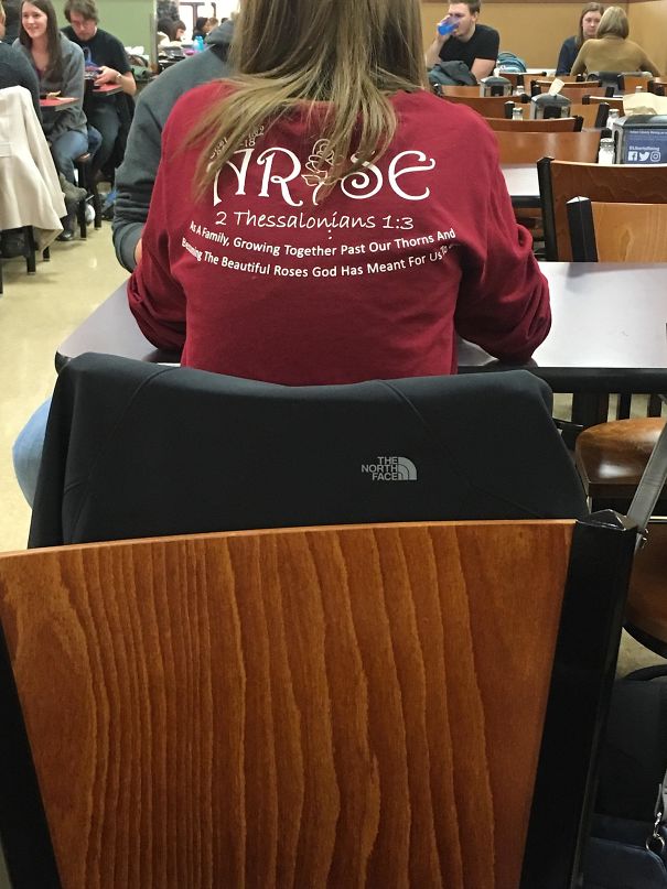 Girl's Shirt Supposedly Says “Arise,” But All I See Is “Arse”