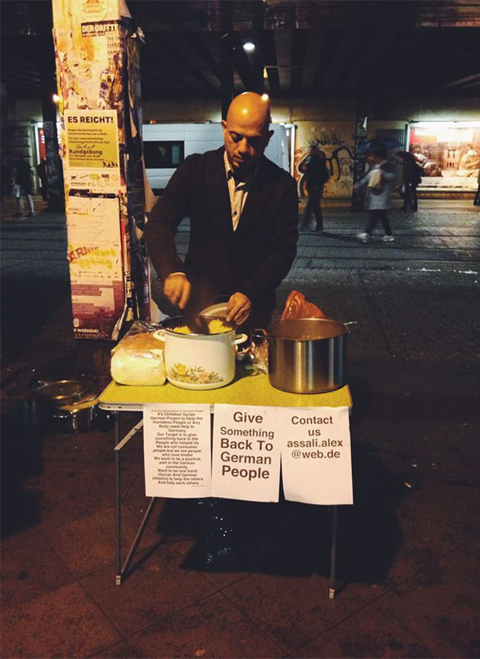 Syrian Refugee Hands Out Food To Homeless In Germany To "Give Something Back"