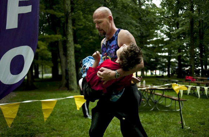 Dad Runs In A Local Triathlon Every Year With His 13 Year Old Daughter. She Has Cerebral Palsy - He Pulls Her In A Kayak During Swim, In Cart During The Bike And Pushes Her Wheelchair For The Run