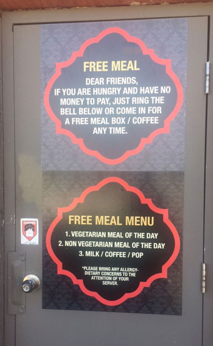 Sign On The Back Door Of A Local Restaurant