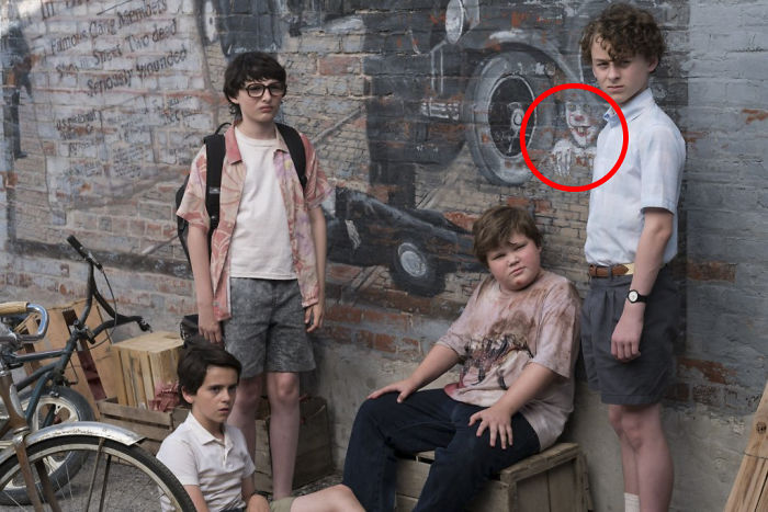 In The Remake Of Stephen King's "It," Pennywise The Clown Can Be Seen Hiding On One Of The Town's Murals