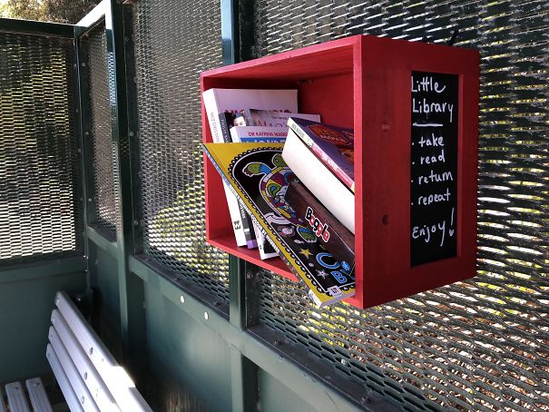 A Bus Stop Nearby Offers A Small Library Of Books To Read