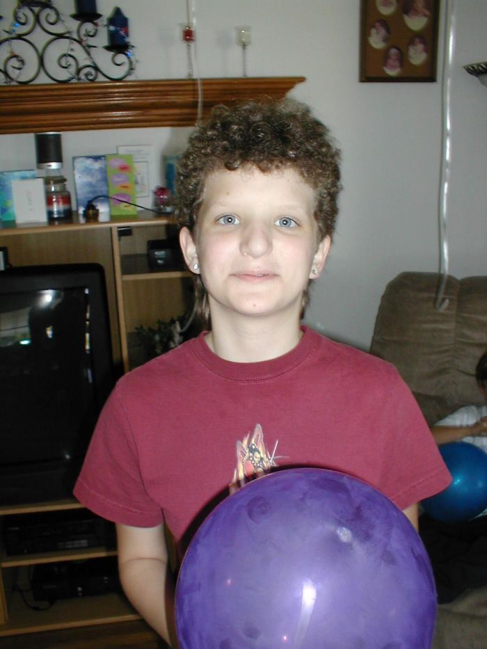 Curly Mullet, Thrift Store Boy’s Anime Shirt, Inability To Look Normal For A Picture: 2003 Was A Cruel Year For This 11yo Girl