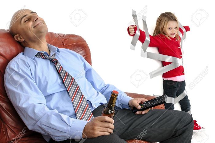 Young girl glued to the wall with duct tape and daddy is relaxing in armchair and having a beer