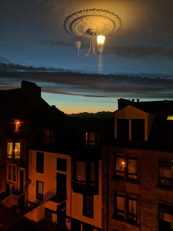 Caught The Reflection Of The Light In The Window, Looks Like It's Floating In The Sky!