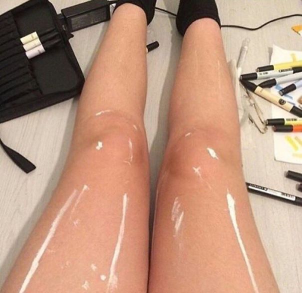 Are These Legs Shiny And Oily Or Are They Legs With White Paint On Them