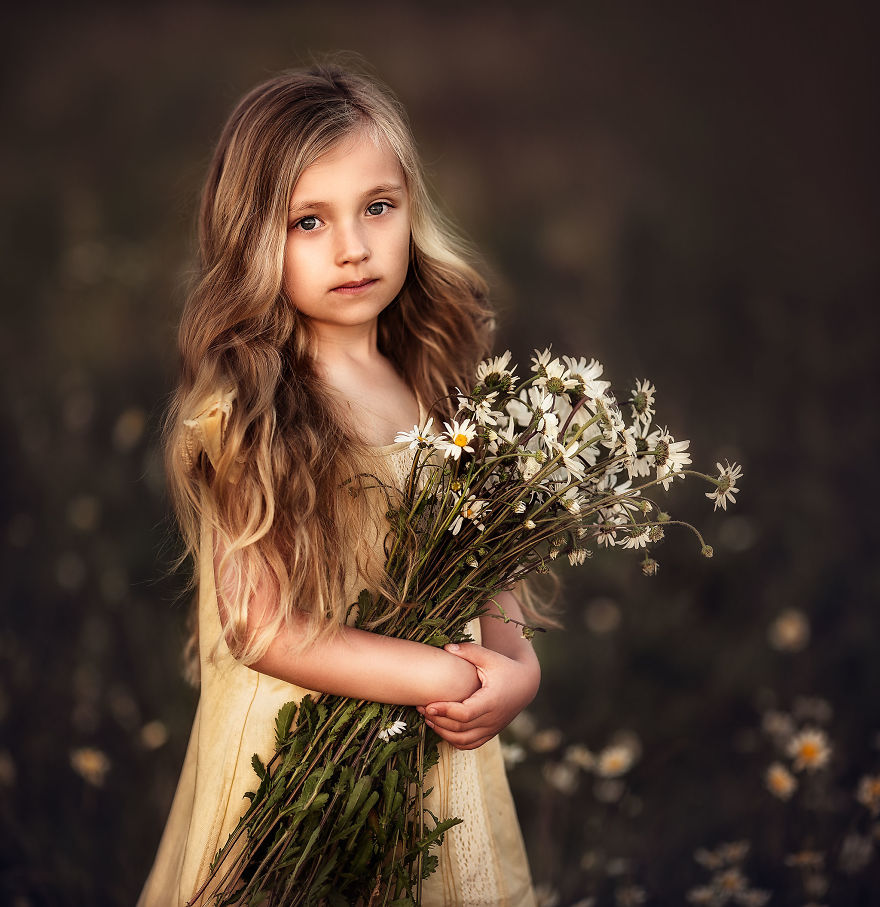 I Promised To Photograph My Daughter With Every Possible Flower In Her Hand