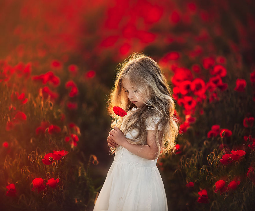 I Promised To Photograph My Daughter With Every Possible Flower In Her Hand