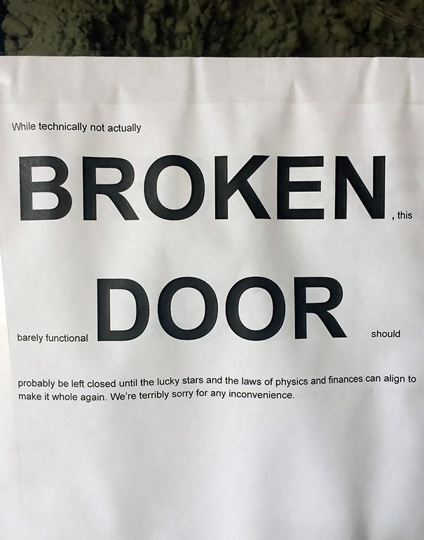 Detailed Broken Door Sign At A Coffee Shop